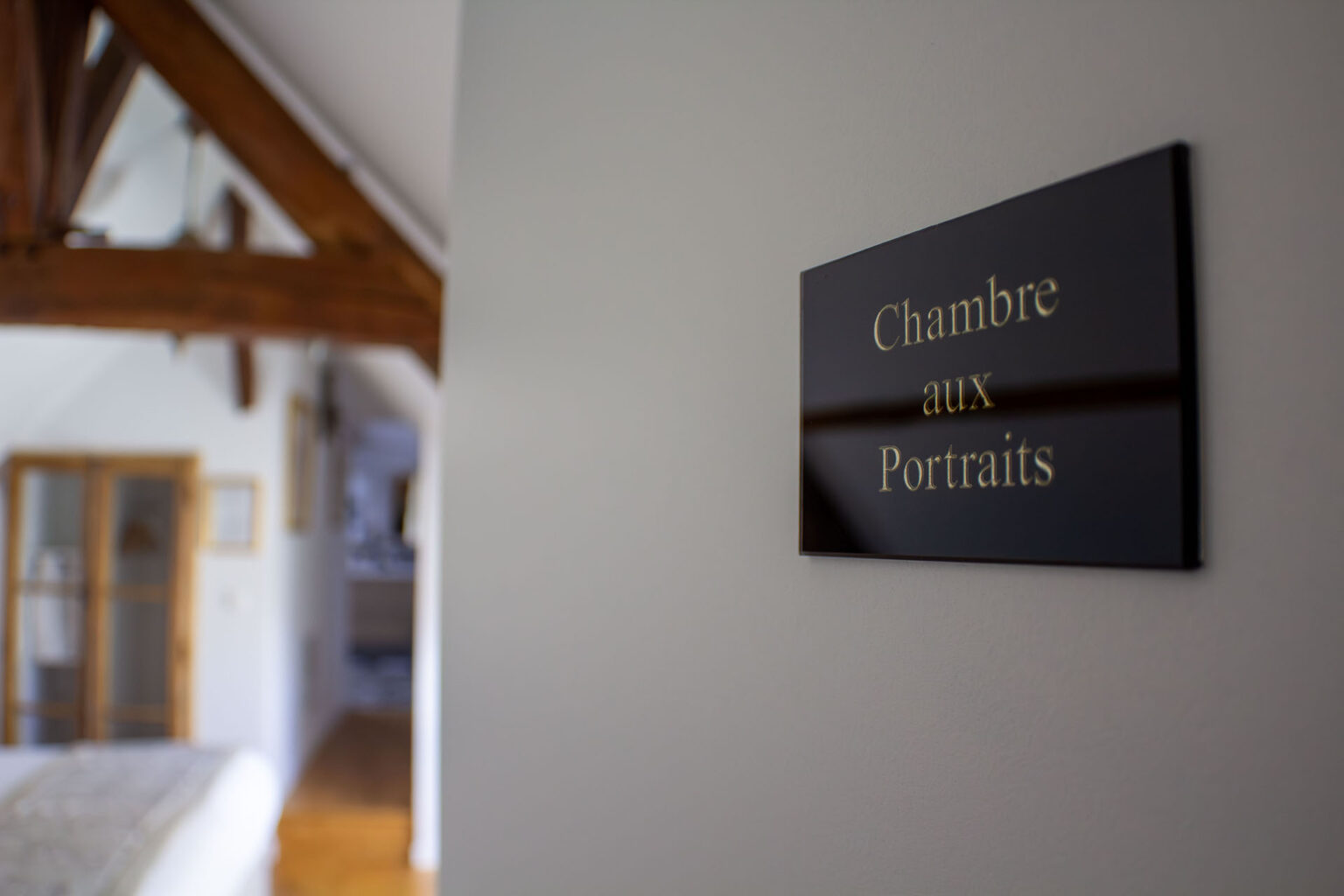 Chambres d'hôtes Au Jeu de Paume, Chambre aux portraits